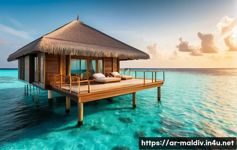 몰디브 바다 전망 숙소 - A luxurious floating villa in the Maldives at sunset, featuring a private wooden deck with sun loung...